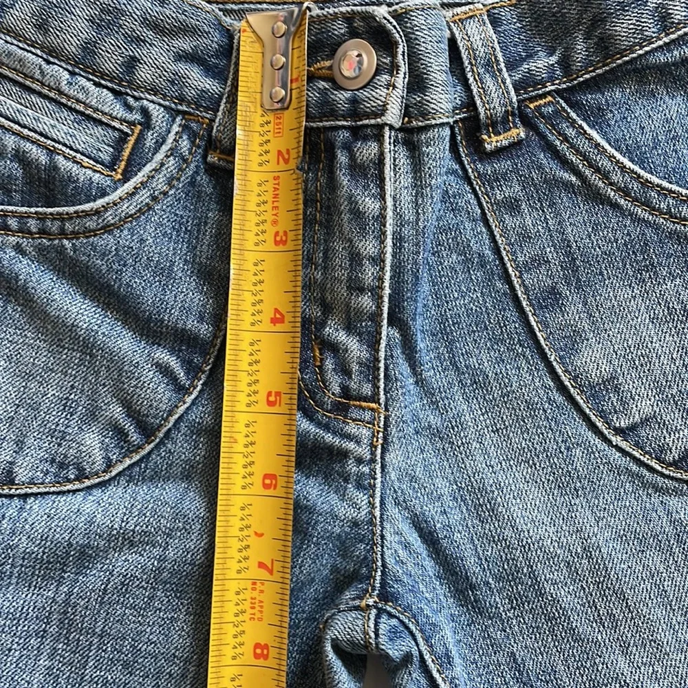 Gymboree flared jeans with gem buttons.  Girls size 7